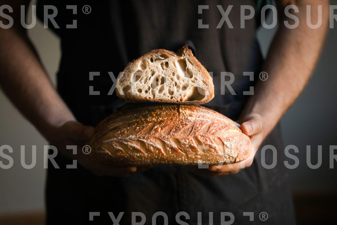 Sourdough bread and hands 1