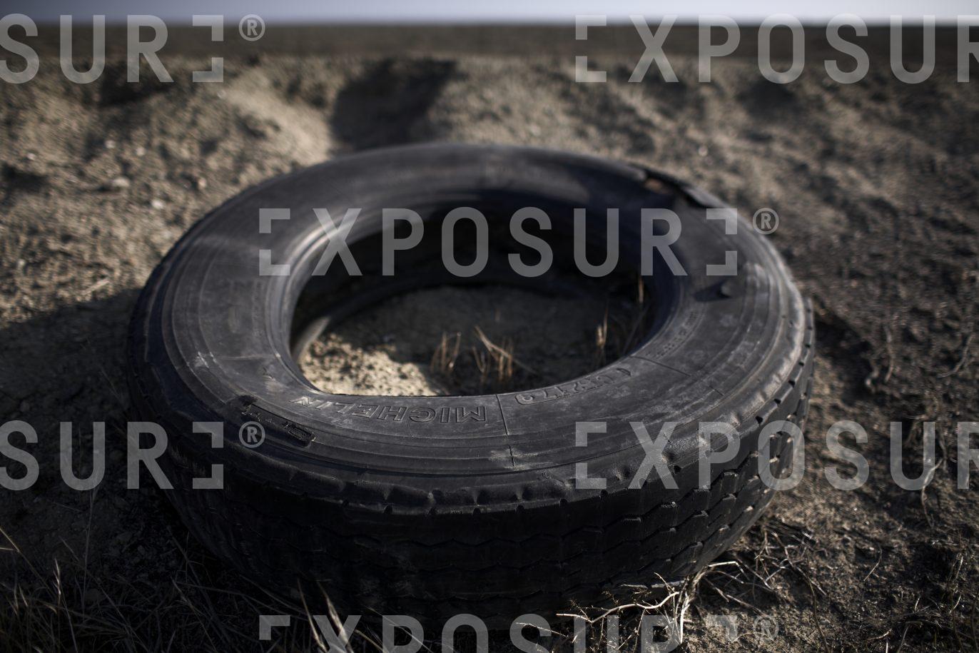 Abandoned truck tyre, California
