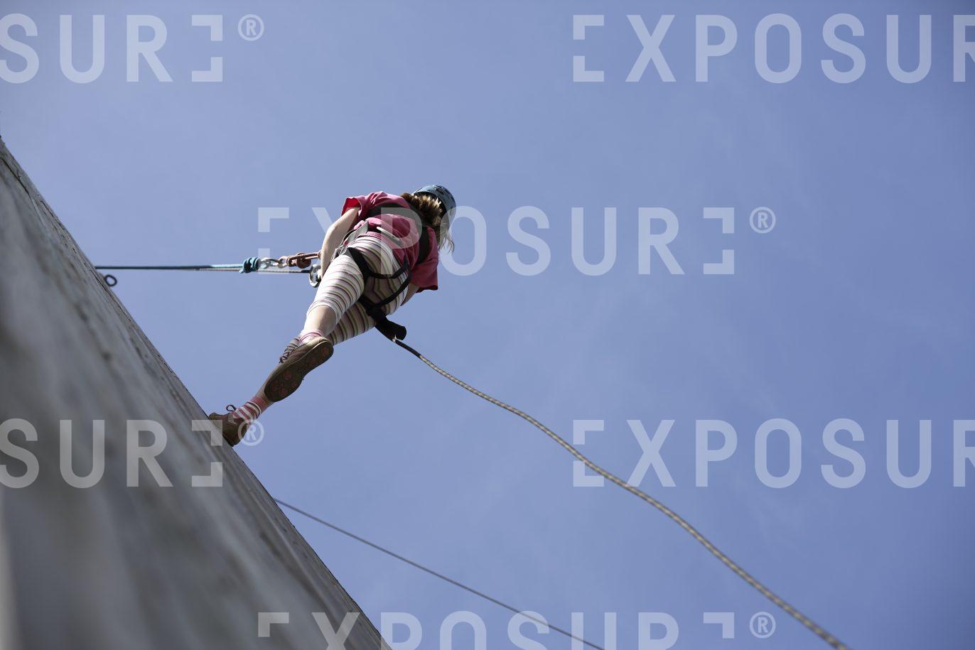 Young girl abseiling