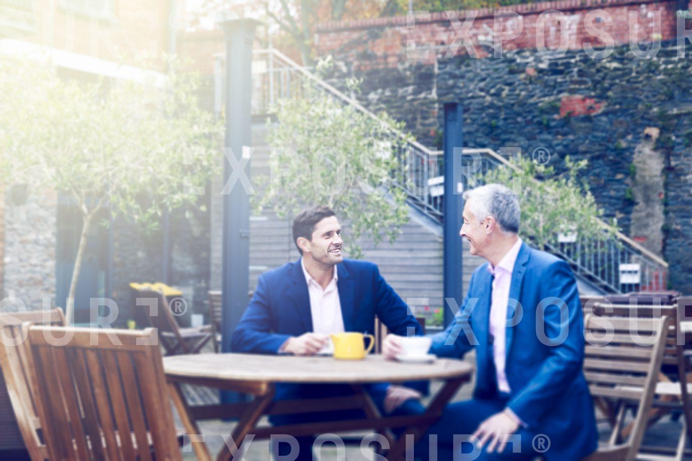 Men Meeting Over A Coffee